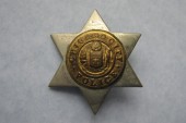 A button from Albert's police uniform.